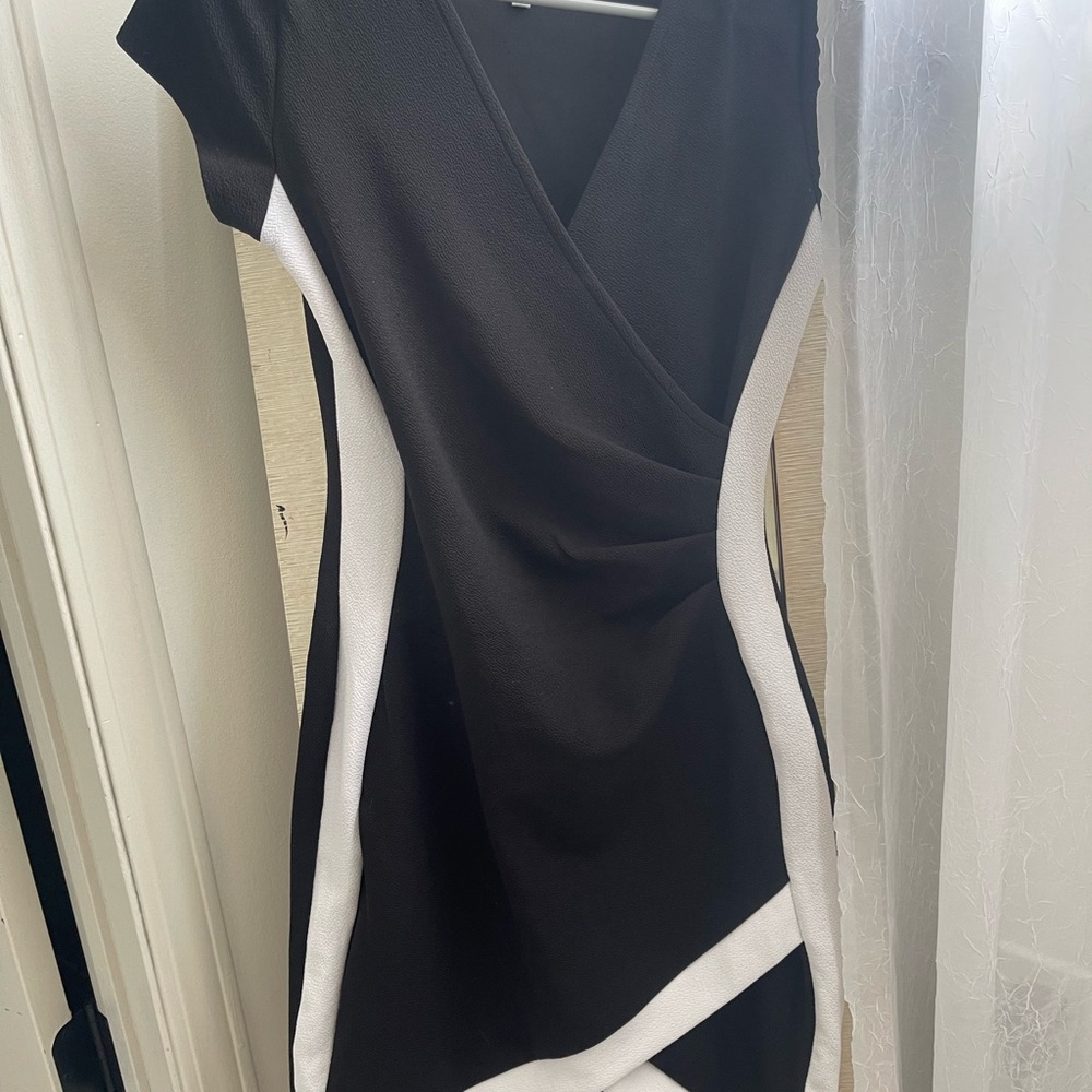 Black dress white details